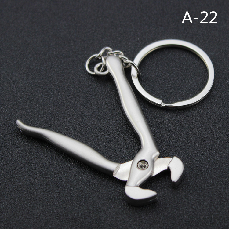 مفتاح ربط صغير جديد للنشاط الم - مراجعة Heavy Equipment Key Ring وسعره